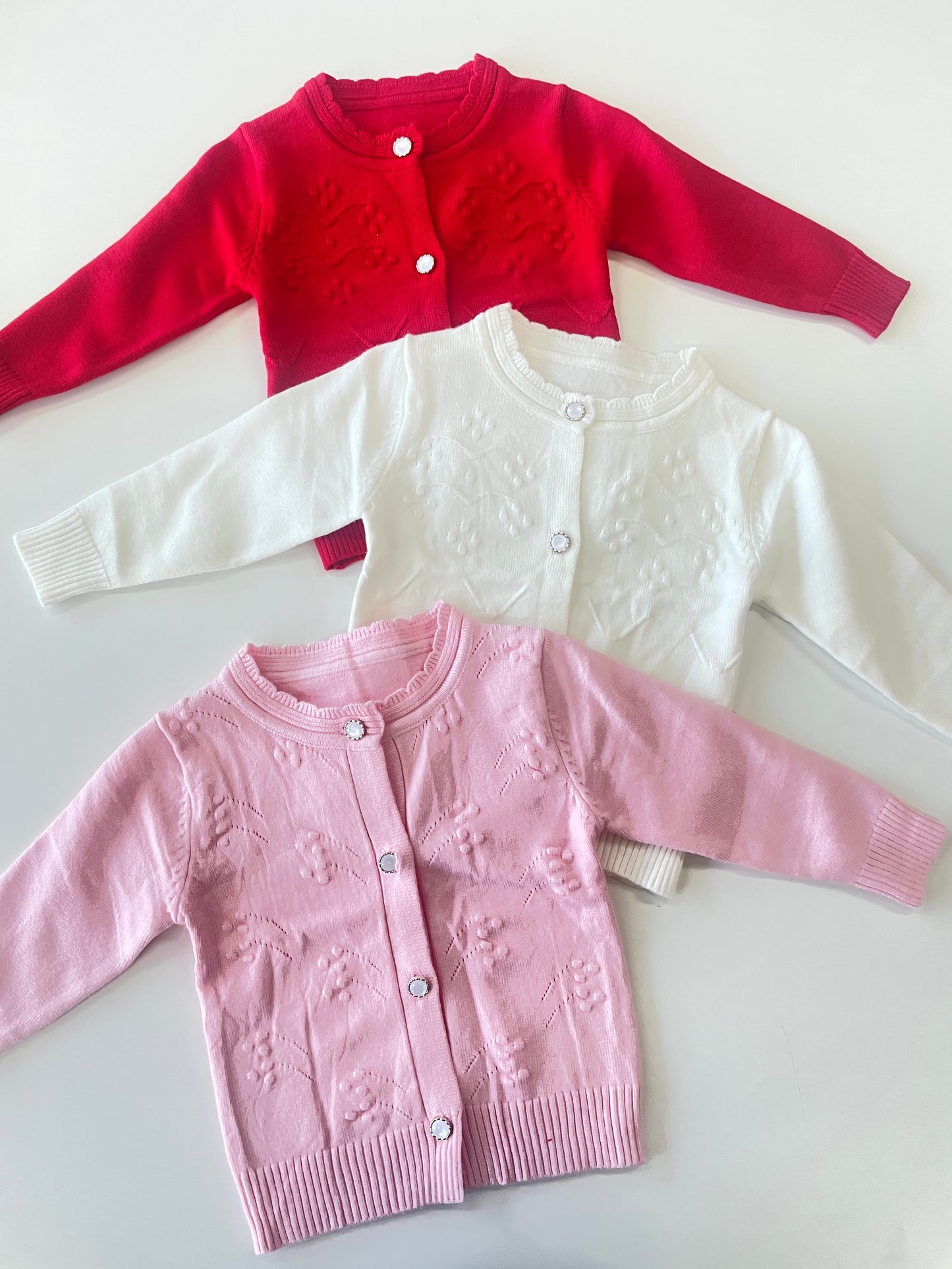 Chaleco Botones blanco y rosado